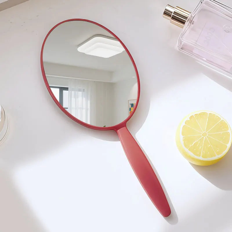 Zonyin Custom Logo Plastic Oval Handle Makeup Mirror Abs Material Cosmetic Hand Mirror Portable Hand Held Mirrors for Travel