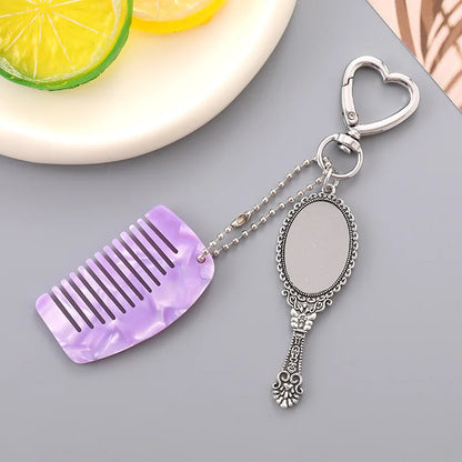 Zonyin Wholesale Mini Handle Handheld Makeup Mirror Keychain with Pendant Comb Mobile Phone Hanging Bag Decorative Accessories