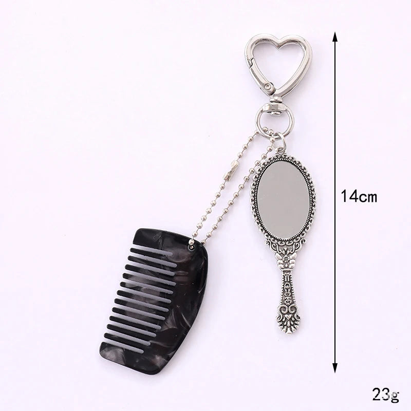 Zonyin Wholesale Mini Handle Handheld Makeup Mirror Keychain with Pendant Comb Mobile Phone Hanging Bag Decorative Accessories