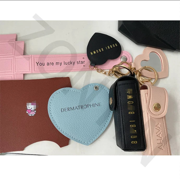 Zonyin High Quality Love Shape PU Leather Makeup Keychain Mirror Portable Heart Small Mirror and Lipstick Holder for Women Girls