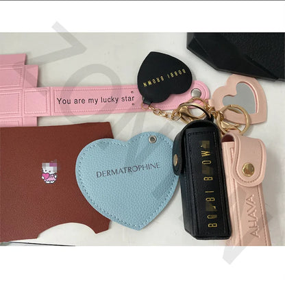 Zonyin High Quality Love Shape PU Leather Makeup Keychain Mirror Portable Heart Small Mirror and Lipstick Holder for Women Girls