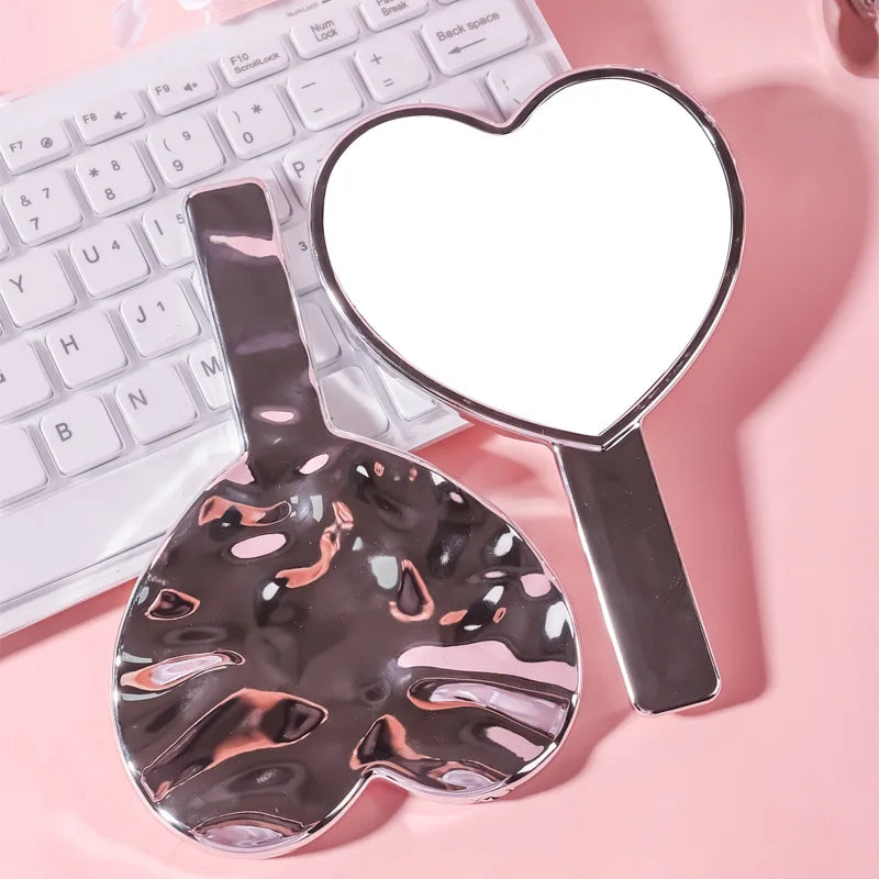 Zonyin Wholesale pink Heart Shape Handheld Makeup Mirror Portable Plating Water Ripple Vanity Cosmetic Mirror for Girl Custom