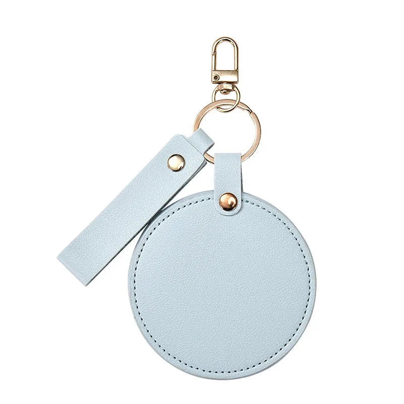 Zonyin LOW MOQ Customized Logo Round Pocket Cosmetic Mirror Pu Leather Portable Small Compact Makeup Mirror with Keychain