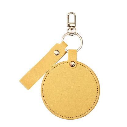 Zonyin LOW MOQ Customized Logo Round Pocket Cosmetic Mirror Pu Leather Portable Small Compact Makeup Mirror with Keychain