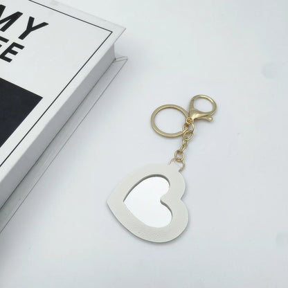 Zonyin High Quality Small Heart Makeup Mirror Key Chain Promotional Heart Shape Key Ring Love Shape Mirror PU Leather Keychain