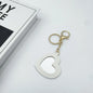 Zonyin High Quality Small Heart Makeup Mirror Key Chain Promotional Heart Shape Key Ring Love Shape Mirror PU Leather Keychain