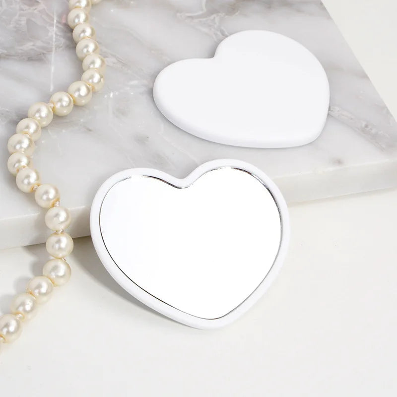 Zonyin Wholesale Cute Plastic Small Heart Pocket Makeup Mirror Custom Logo Mini Portable Compact Travel  Mirror  for Women Girls