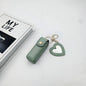 Zonyin High Quality Love Shape PU Leather Makeup Keychain Mirror Portable Heart Small Mirror and Lipstick Holder for Women Girls