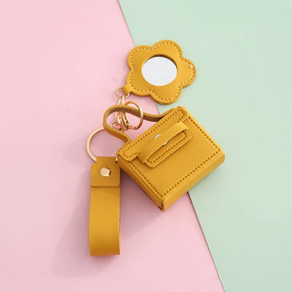 Zonyin PU Leather Mini Bag Storage with Flower Shape  Makeup Mirror Earphone Bag Keychain Pendant