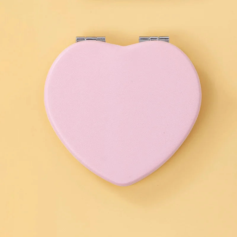 Zonyin Wholesale Private Label Heart Shape Pocket Mirror Double-Side Pu Portable Compact Travel Size Cosmetic Heart Mirror